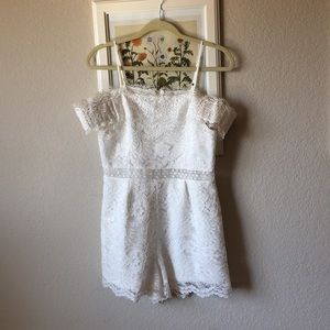 Pretty little white lace romper from Francesca’s.